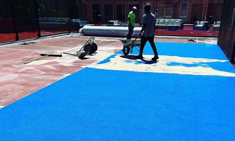 Why do padel courts use sand?