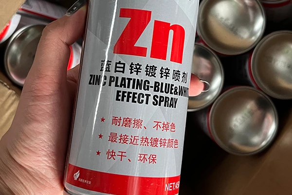 Re-spraying the damage points of the zine layer